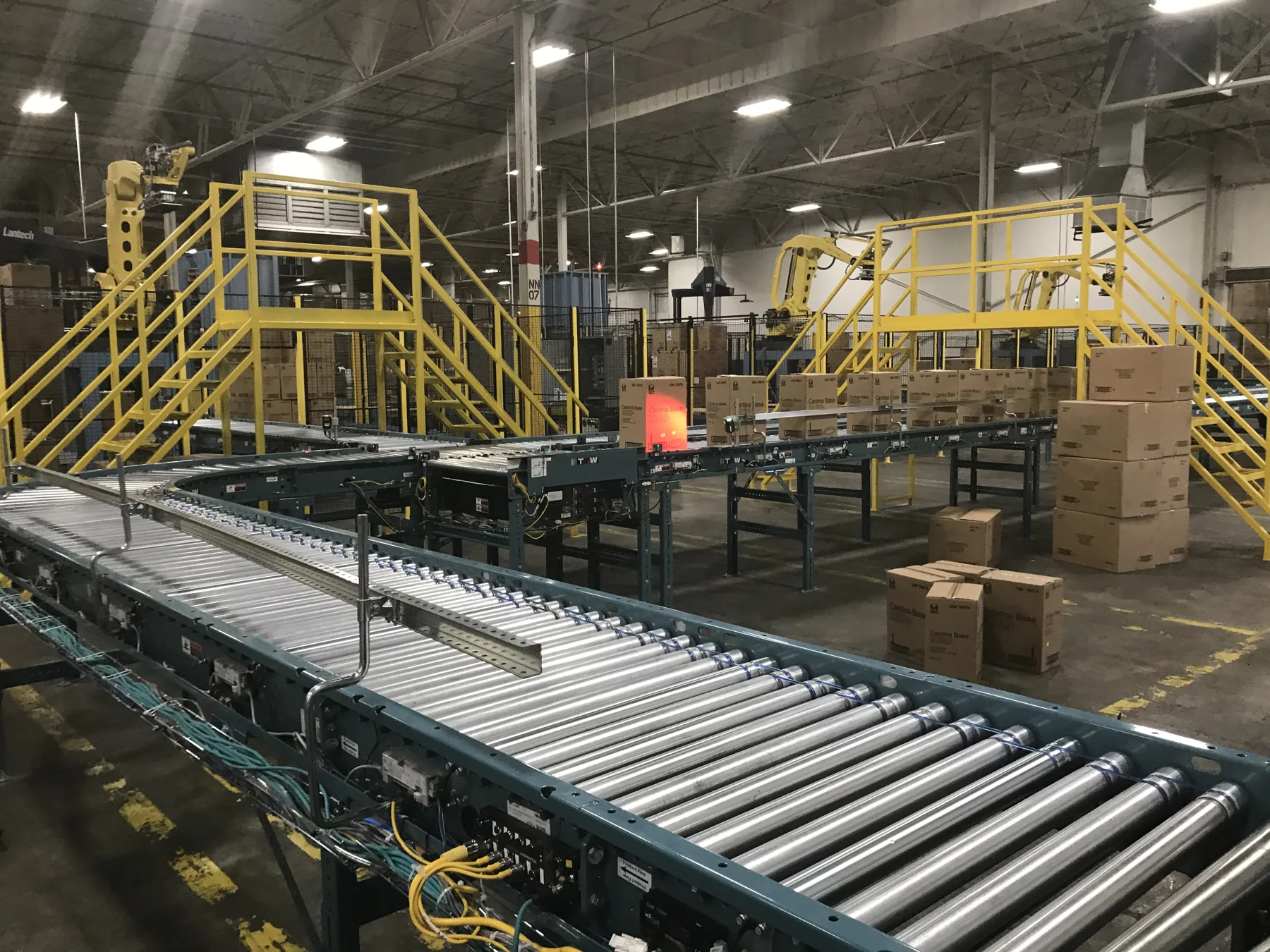Roller conveyors and elevated material handling equipment