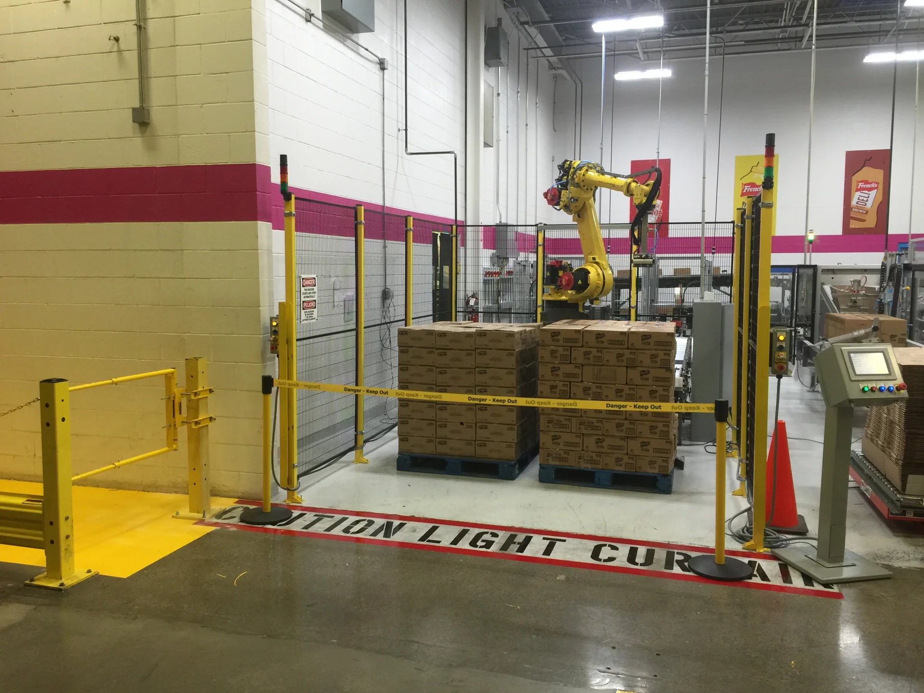 Existing robotic palletizing system being modified and upgraded
